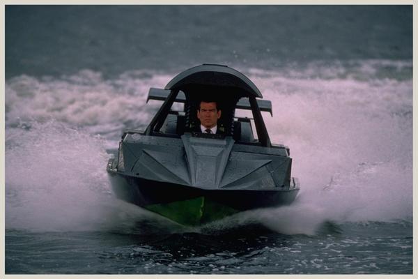 Bond chases cigar girl in jetboat