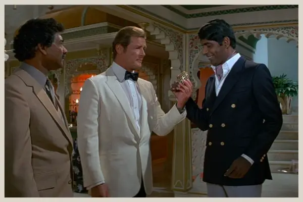 Vijay with Bond discussing the faberge egg