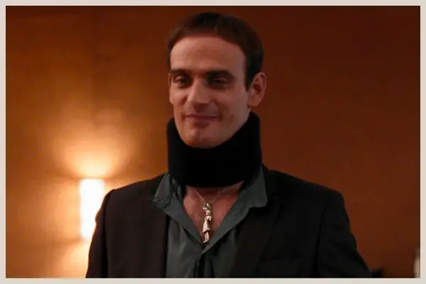 Elvis with a neck brace on in Quantum of Solace