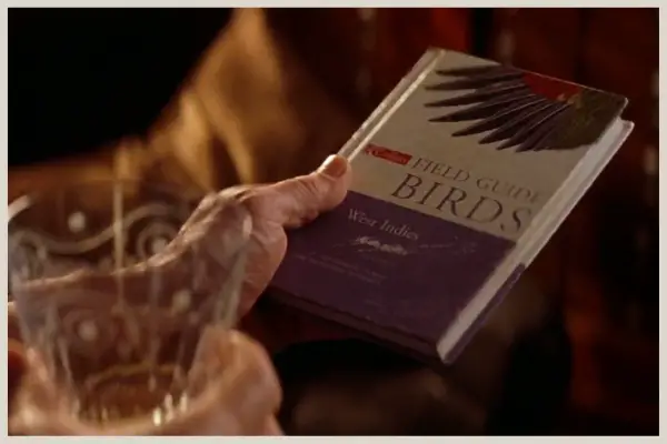 James Bond holding a copy of Birds of the West Indies in Die Another Day